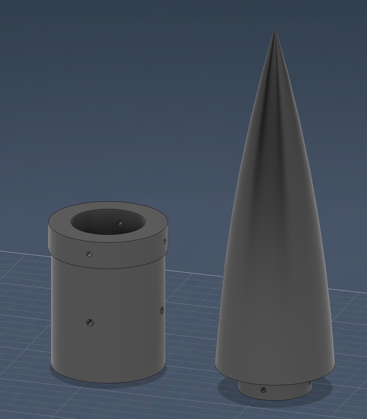 CAD render of the pointed nose cone beside its cylindrical coupler